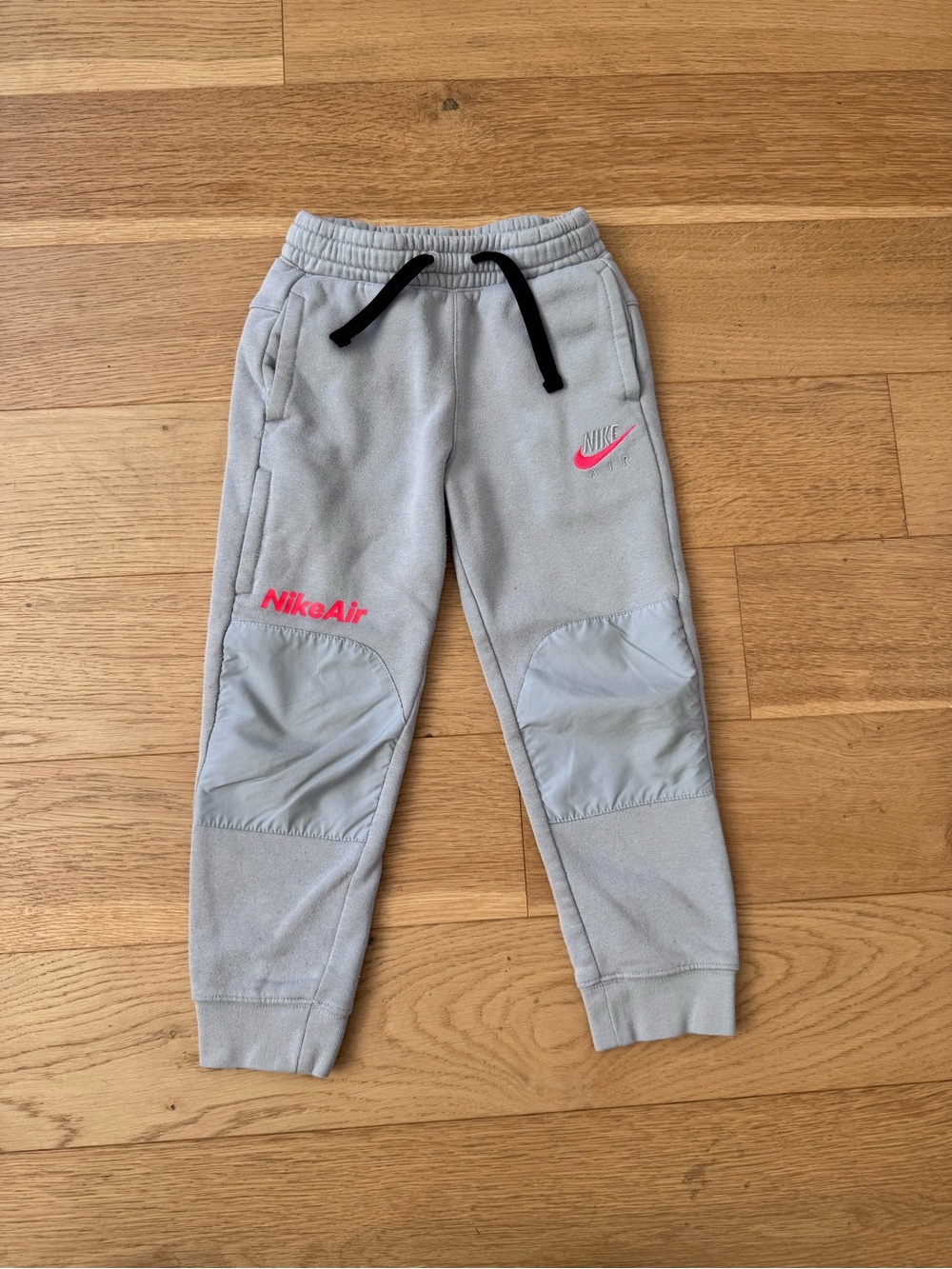 Nike Air Kids Light Gray Jogger Pants with Pink Swoosh